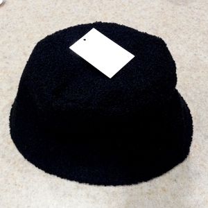 Black Bucket fabric hat. Worn once. Like new.